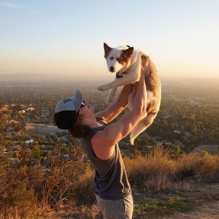 Montana Jordan enjoying a quality life with his dog. 